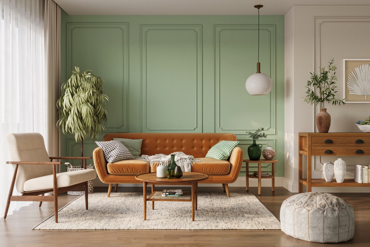 Salón con pared verde y sofá de cuero estilo mid-century — Ocho Noches Vacacional